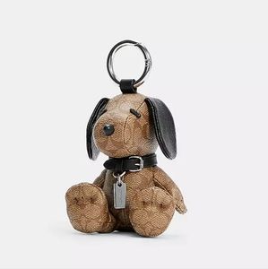 NIB Coach X Peanuts Snoopy Collectible Bag Charm In Signature Canvas